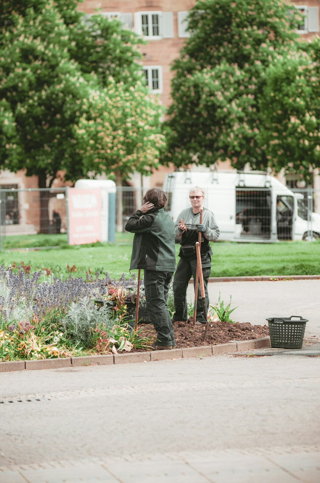 grandfather gardening with child