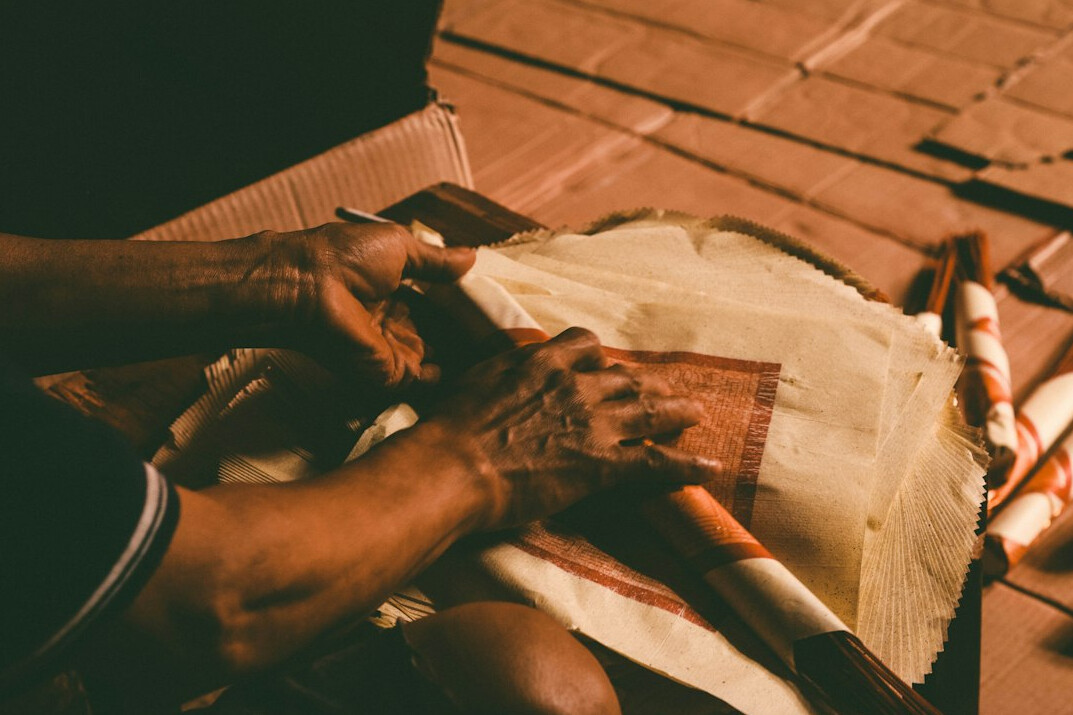 person binding old book